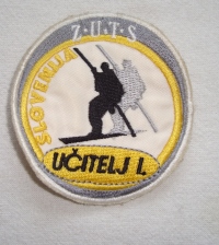 Našitek učitelj I, bivši vodnik smučanja (2004).