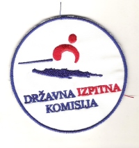 Tudi člani državne izpitne komisije ZUTS so imeli našitke (2004).