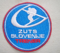 Našitek trener (2012).zahtevana usposobljenost od leta 2010 je učitelj 2 in izpit za klubskega trenerja.